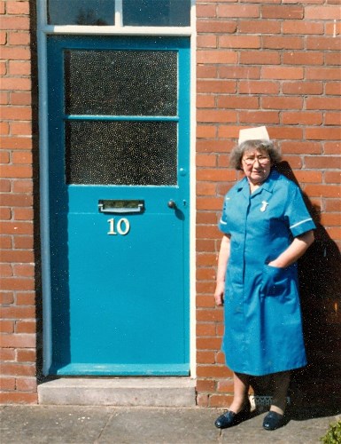 Sadie in nurse uniform